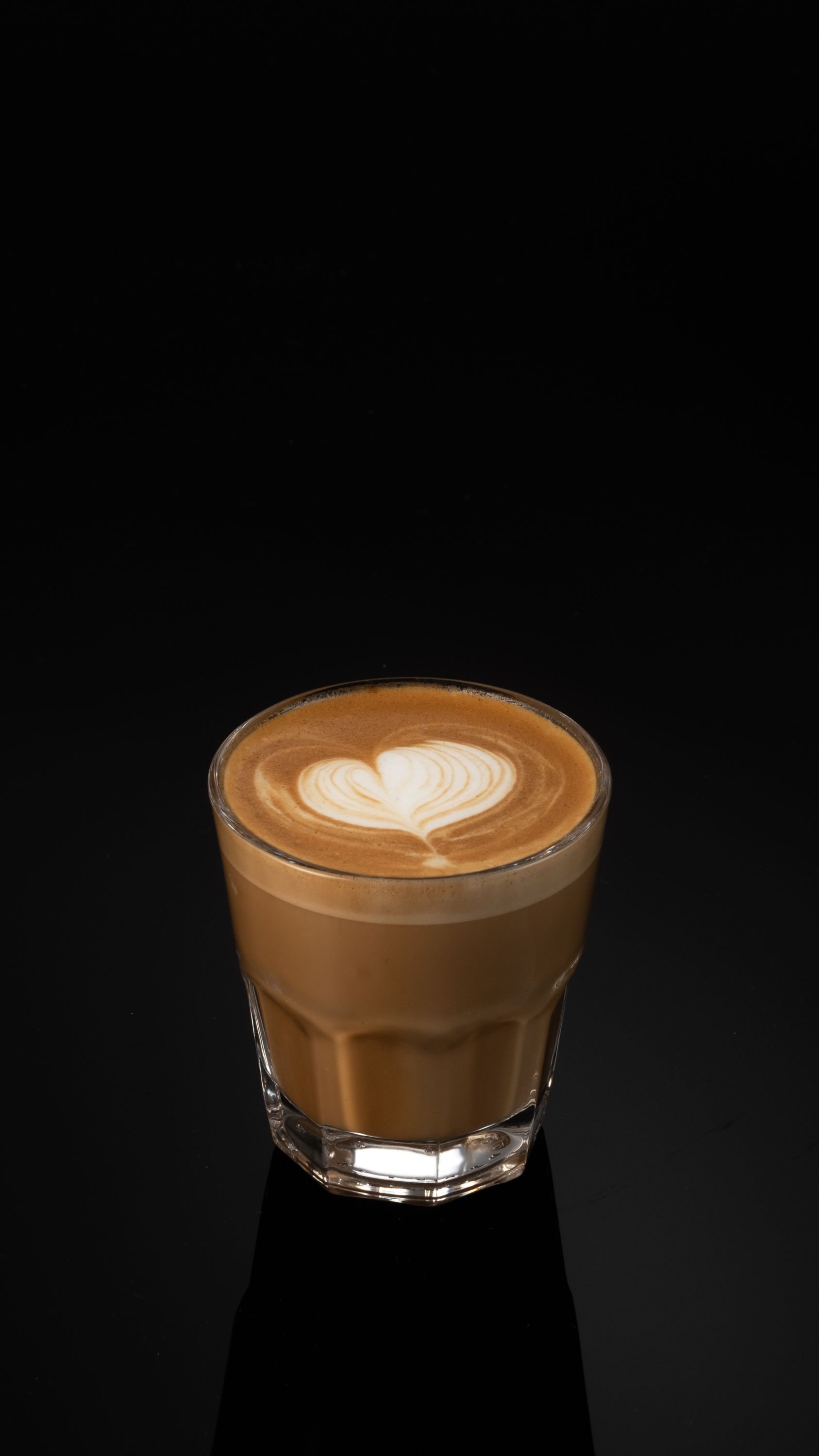 Coffee in glass with latte art